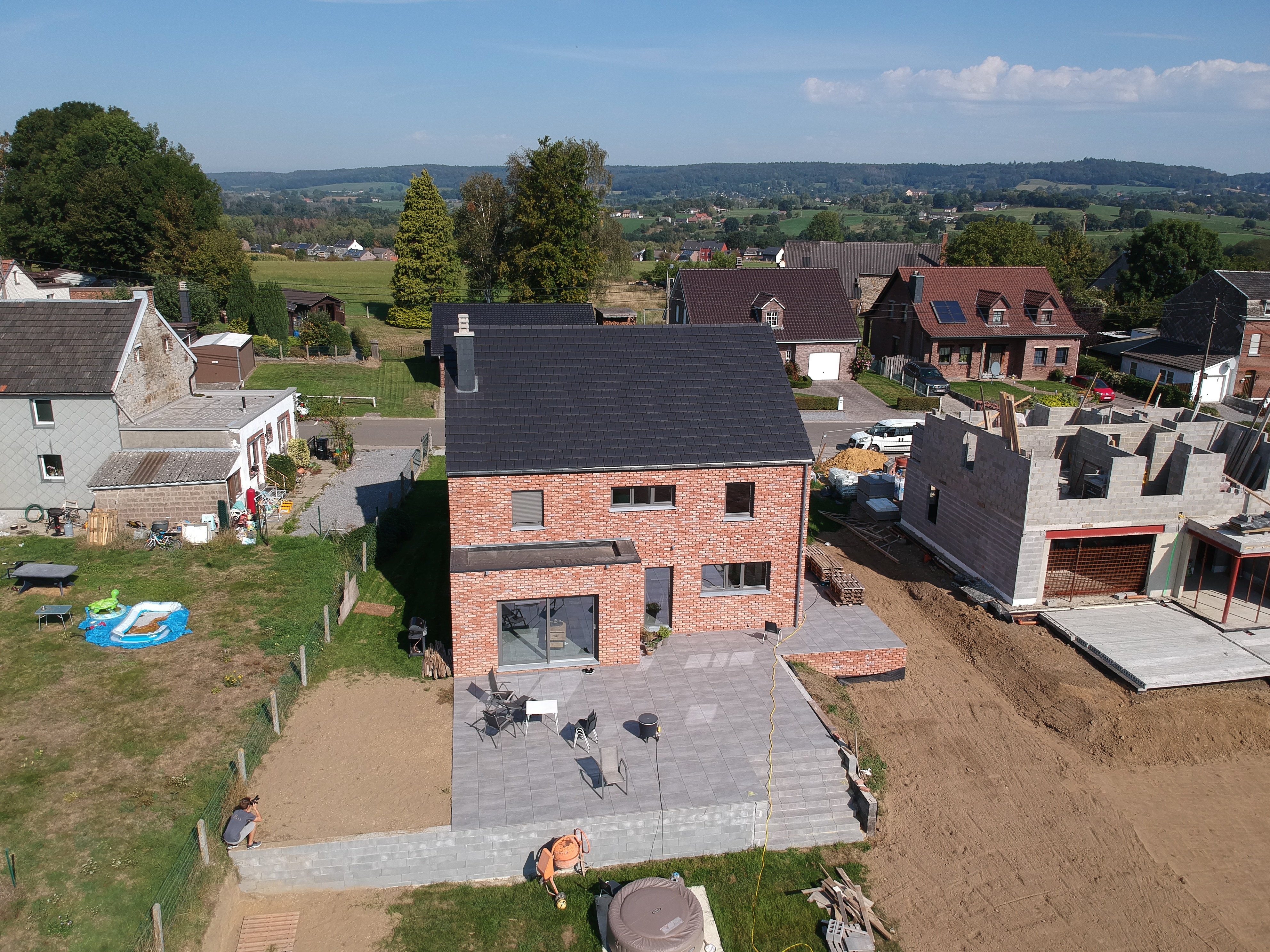 Villa mit Naturstein Bleiberg - Hinteransicht von oben - Danphil-Construction Contractor