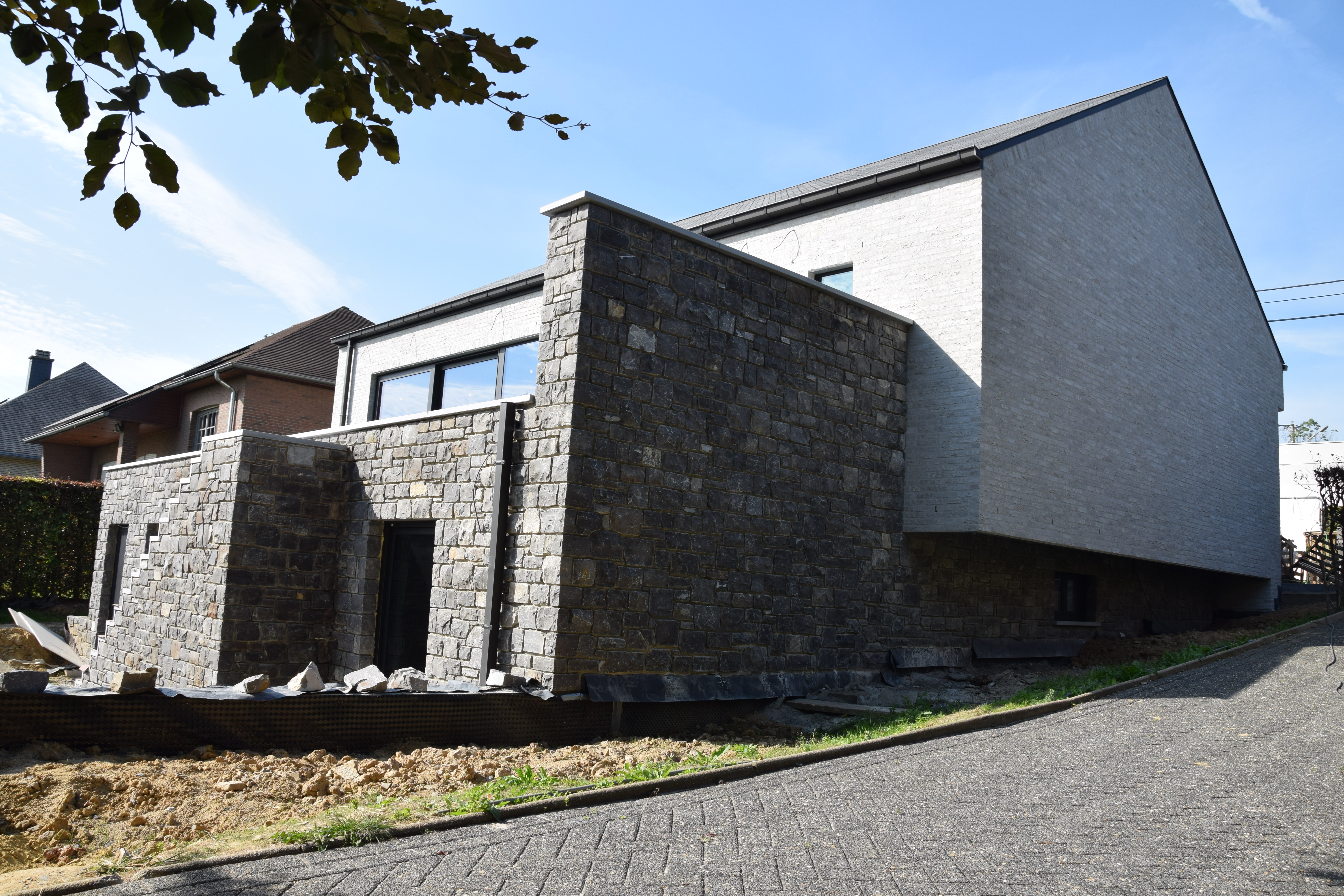 Villa with natural stone Lontzen - Back view right - Danphil-Construction Contractor