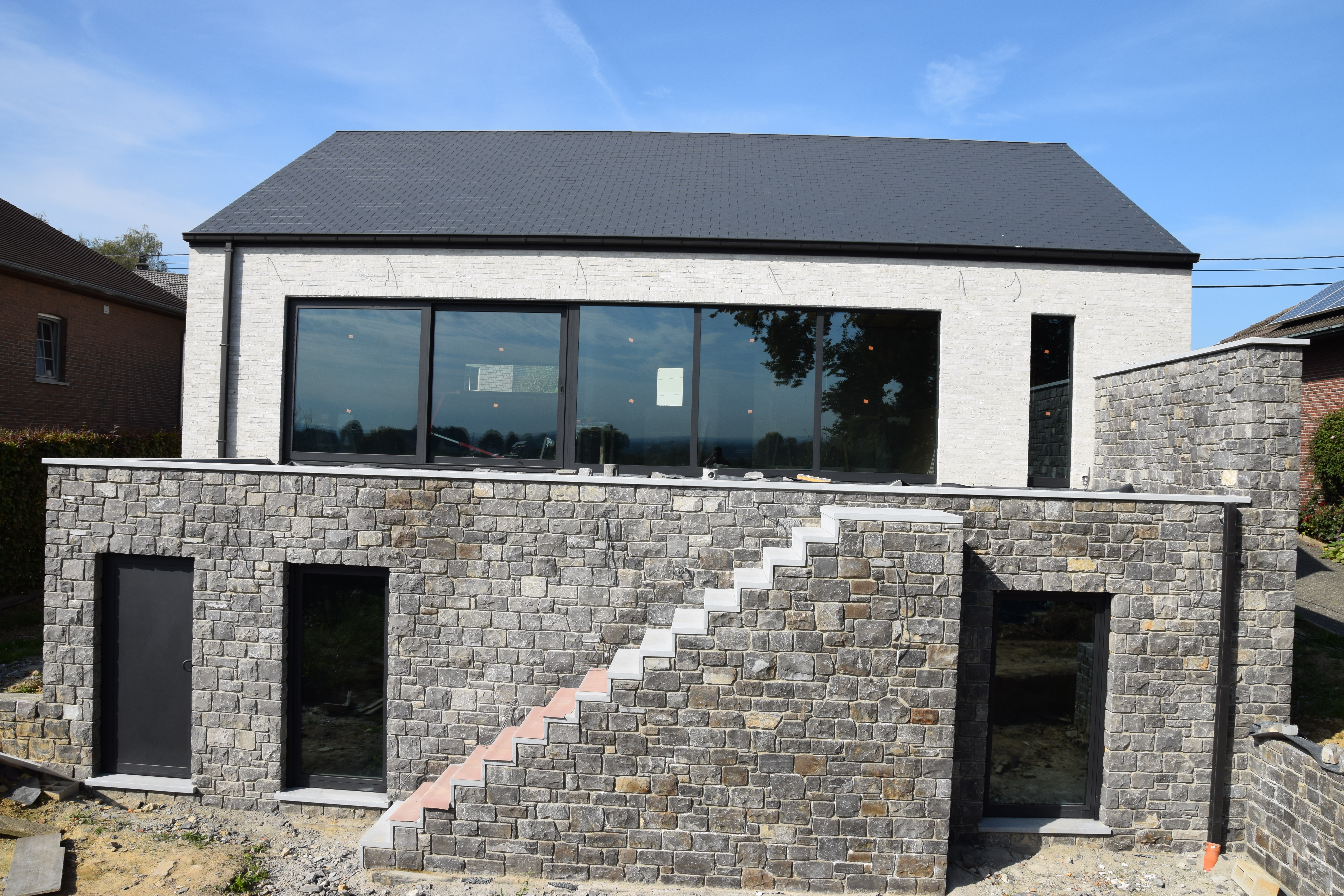 Villa with natural stone Lontzen - Back view central below - Danphil-Construction Contractor