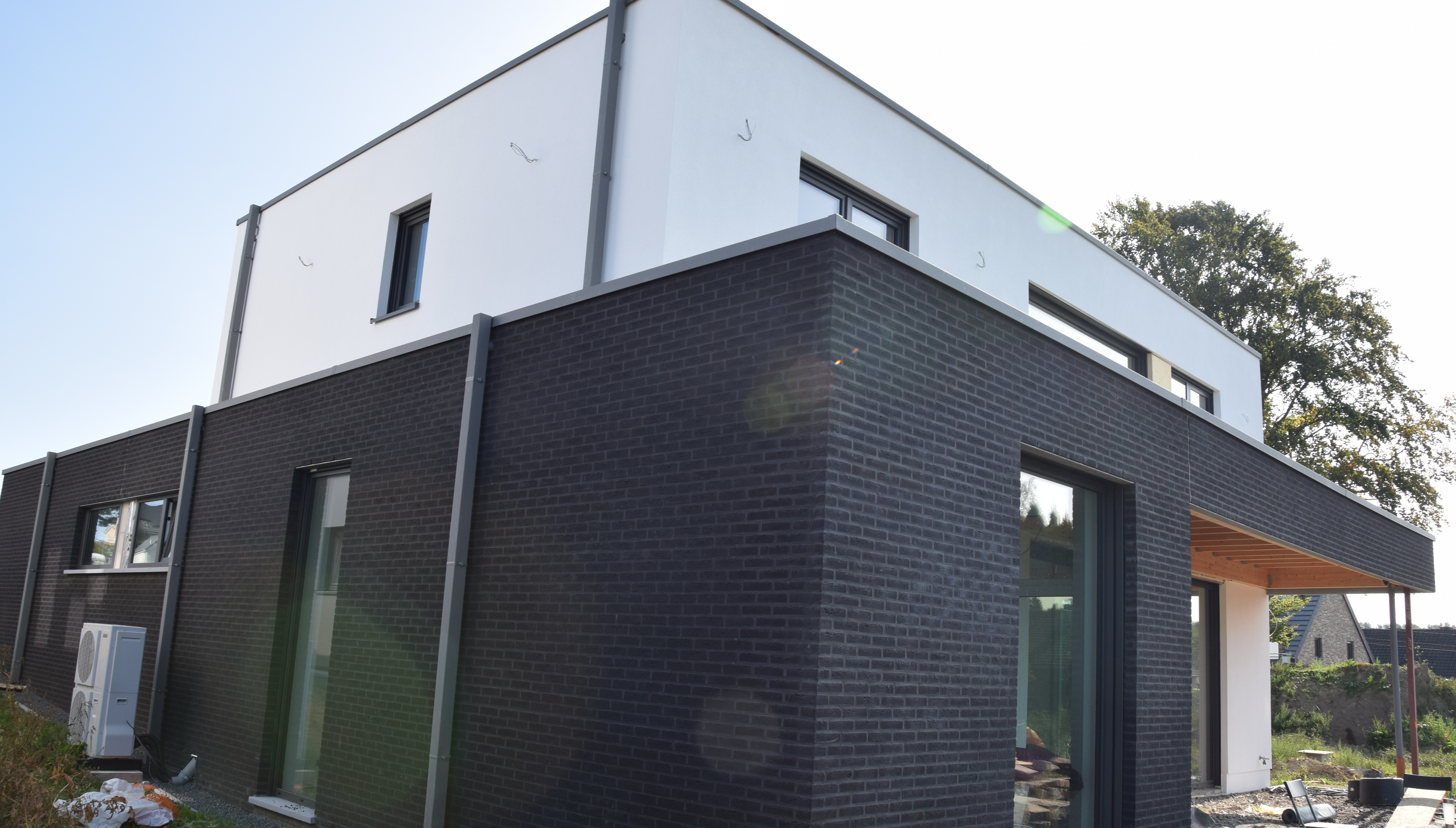 Villa with plastered facade Lichtenbusch Raeren - Back view left (cover) - Danphil-Construction Contractor