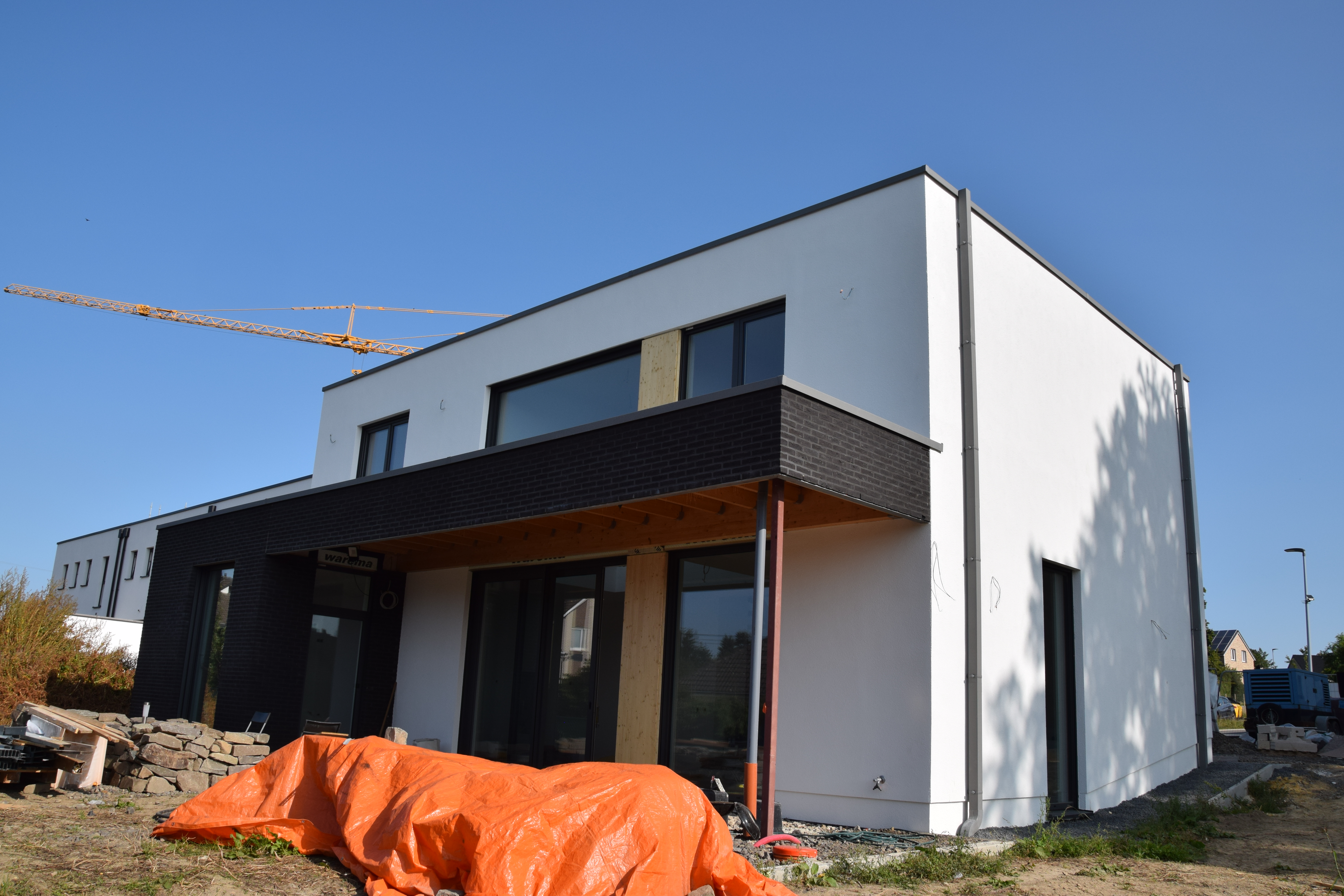 Villa with plastered facade Lichtenbusch Raeren - Back view right - Danphil-Construction Contractor